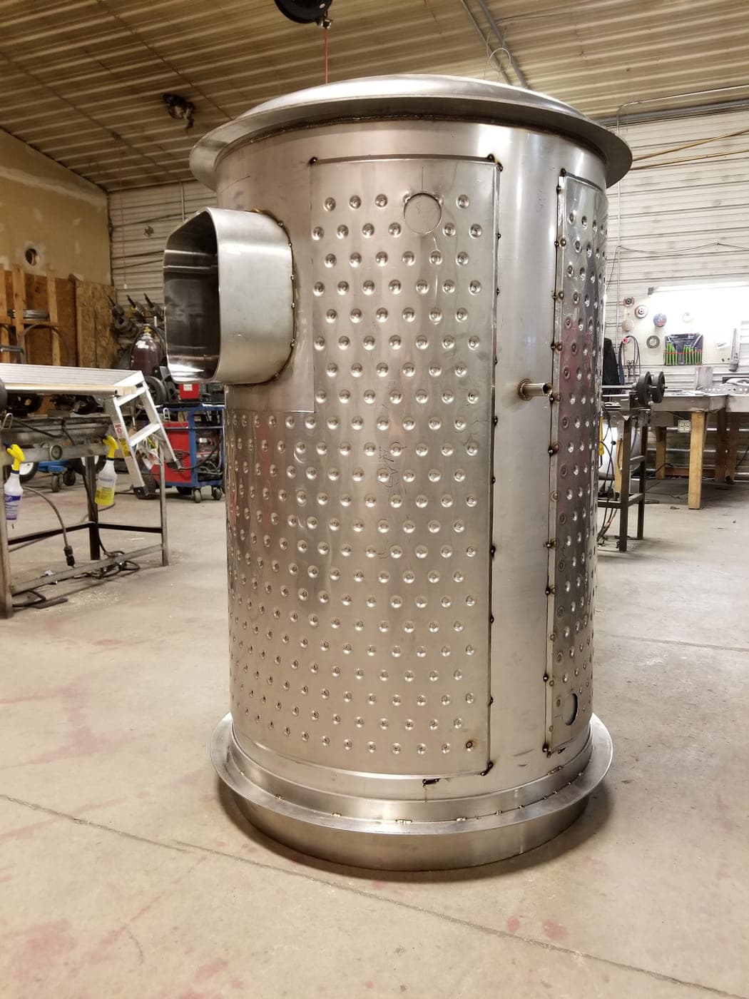 Dimple-jacketed stainless steel vessel with a rectangular side connection under fabrication